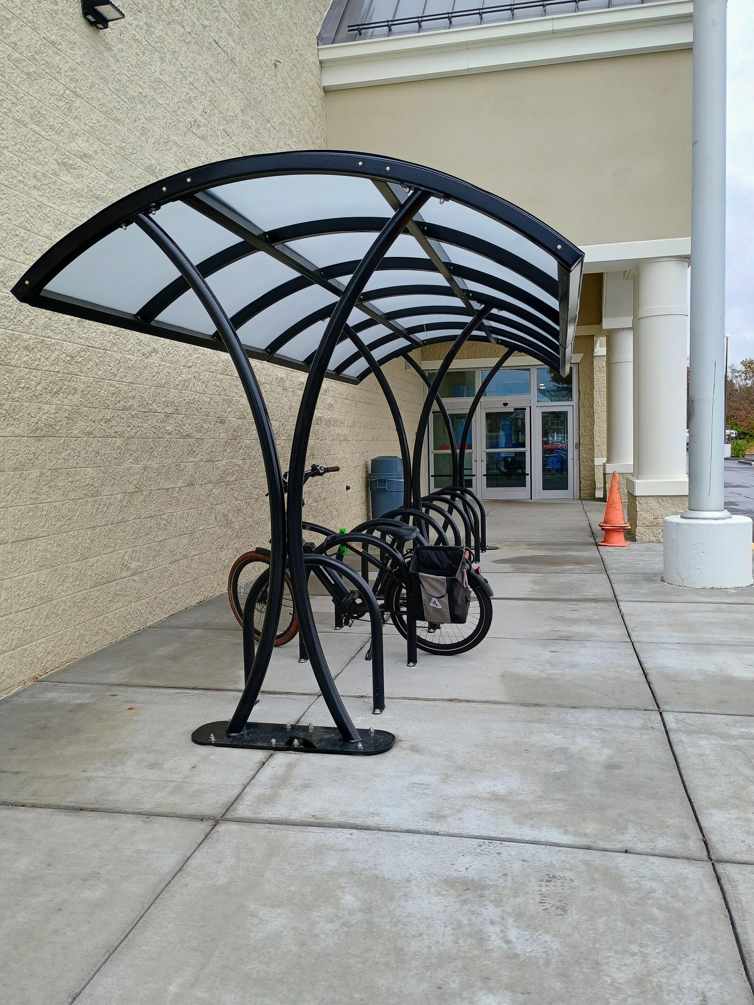 Covered bike rack with several good parking spots.